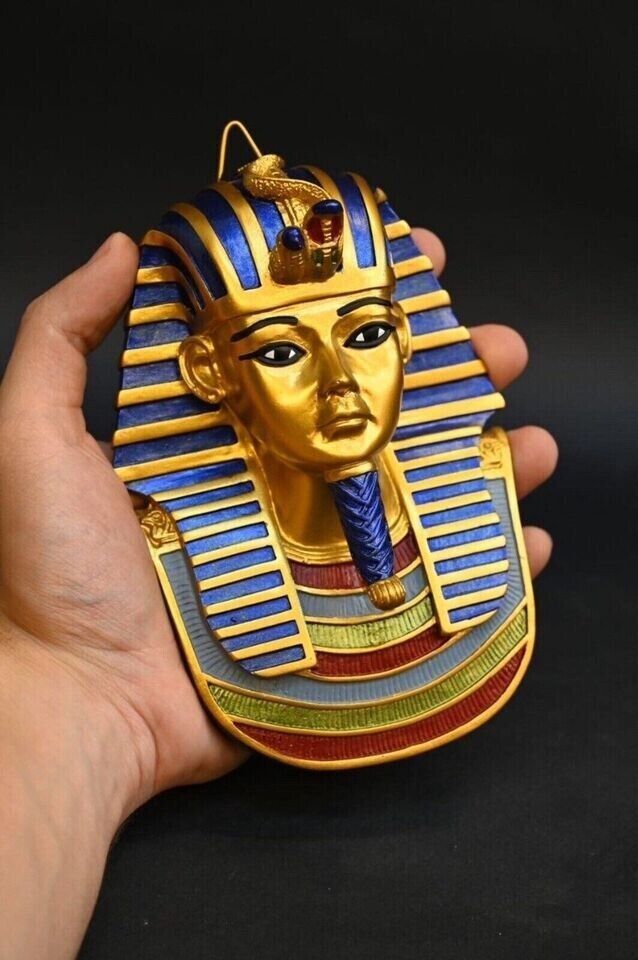 A rare golden mask of King Tutankhamun's face to hang on the wall, handmade BC