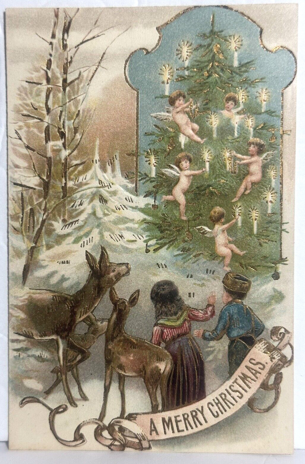Christmas Postcard Angel Cherubs Decorate Tree Children Deer Winter Scene