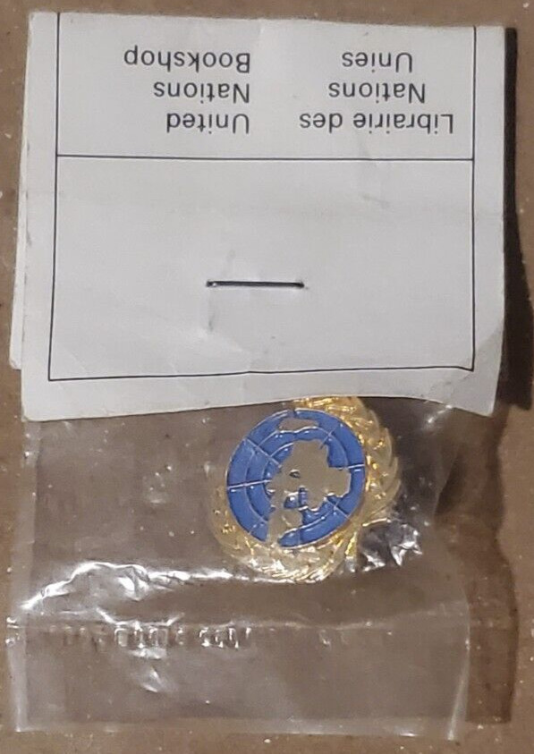 Vintage UN pin in package(Switzerland).