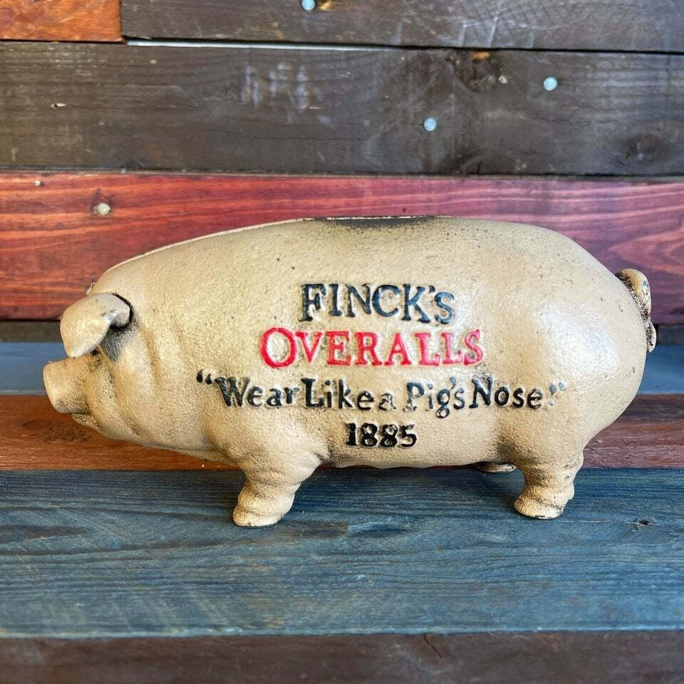 Finck\'s Overalls 1885 Cast Iron Coin Bank With Raised Lettering Antique Finish