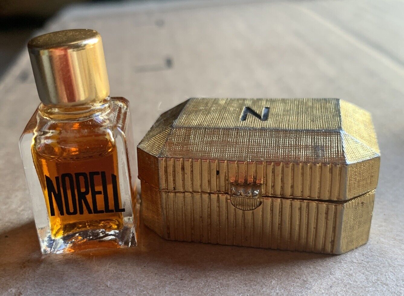 Vintage Norell Parfum Mini Solid Perfume in Gold Treasure Chest