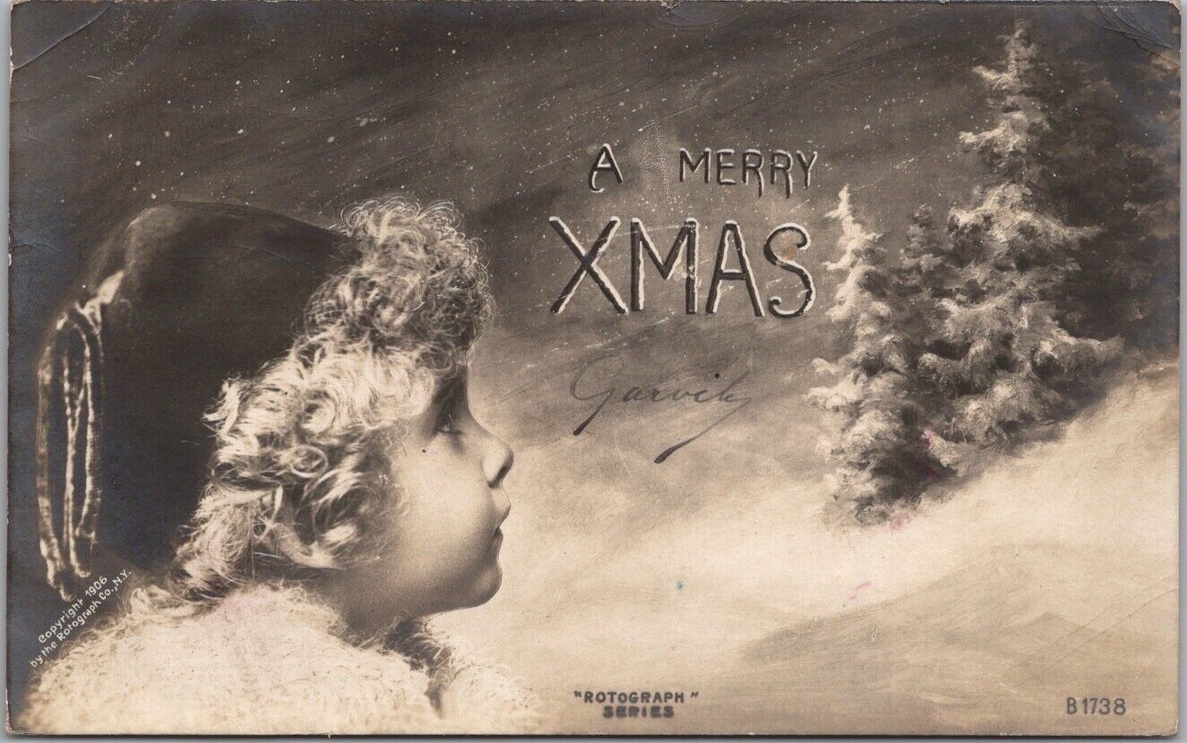 1907 CHRISTMAS Photo RPPC Postcard Girl Looking at Trees A MERRY XMAS Rotograph