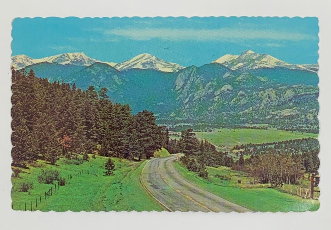 First View of Estes Park from Park Hill on Highway 66 Colorado Postcard Posted