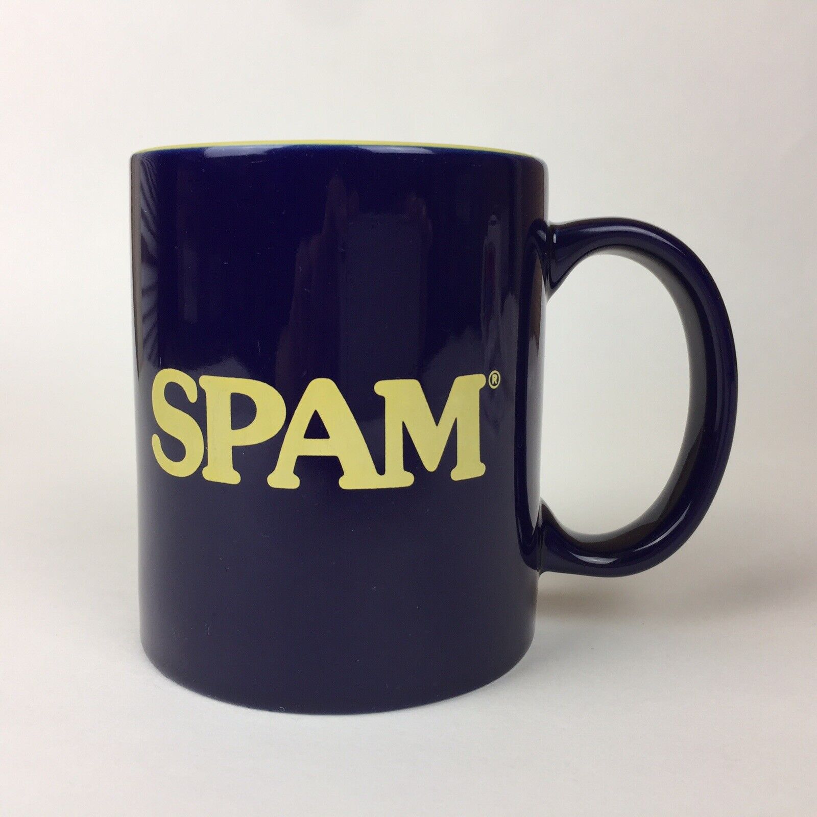Spam Coffee Tea Cup Mug Dark Blue & Yellow 3.75” Tall Approx. 10 fl. oz. Used