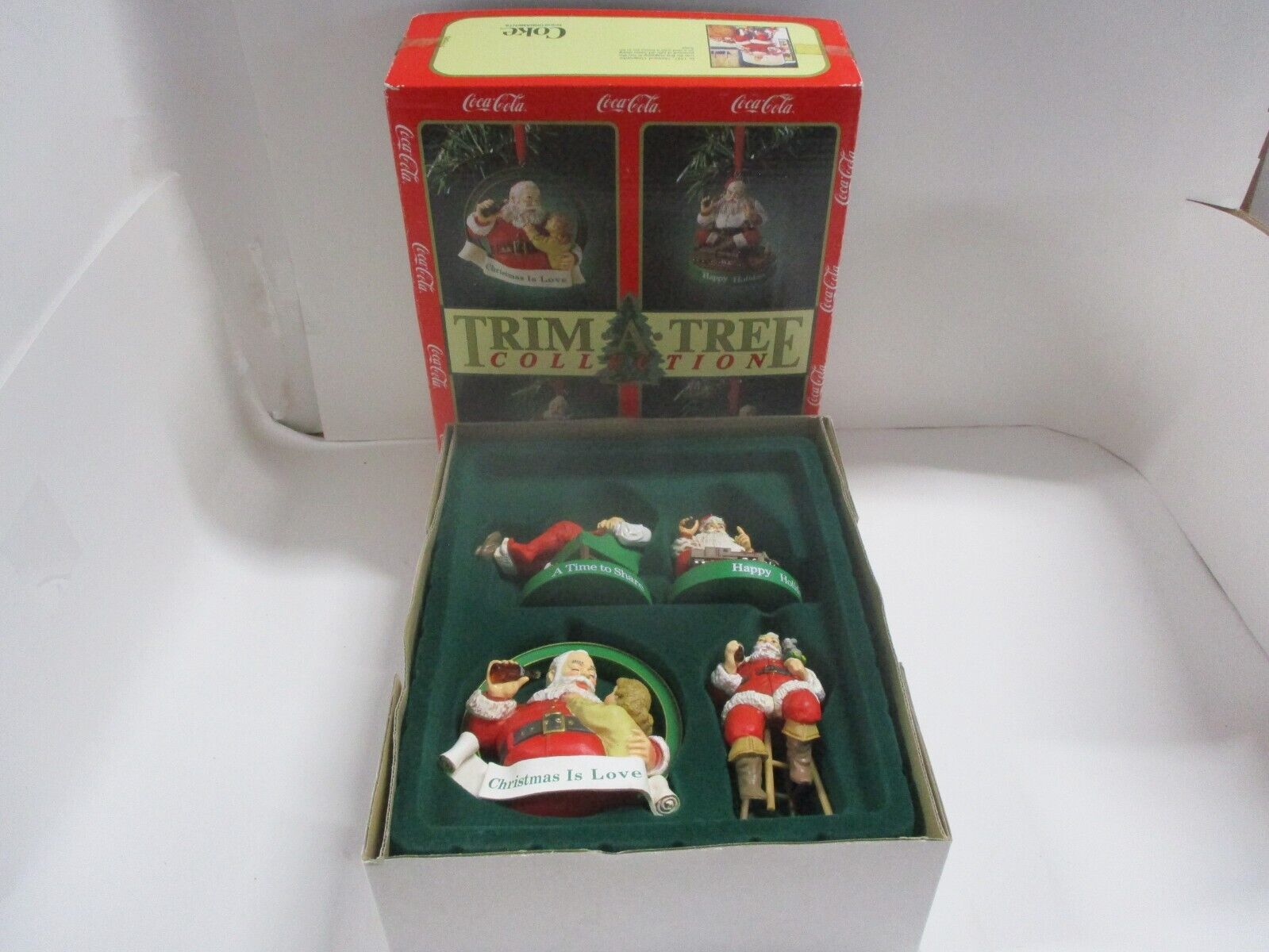 Vintage 1991 Coca-Cola Trim A Tree Santa Boxed Set Of 4 Santa’s Ornaments Boxed