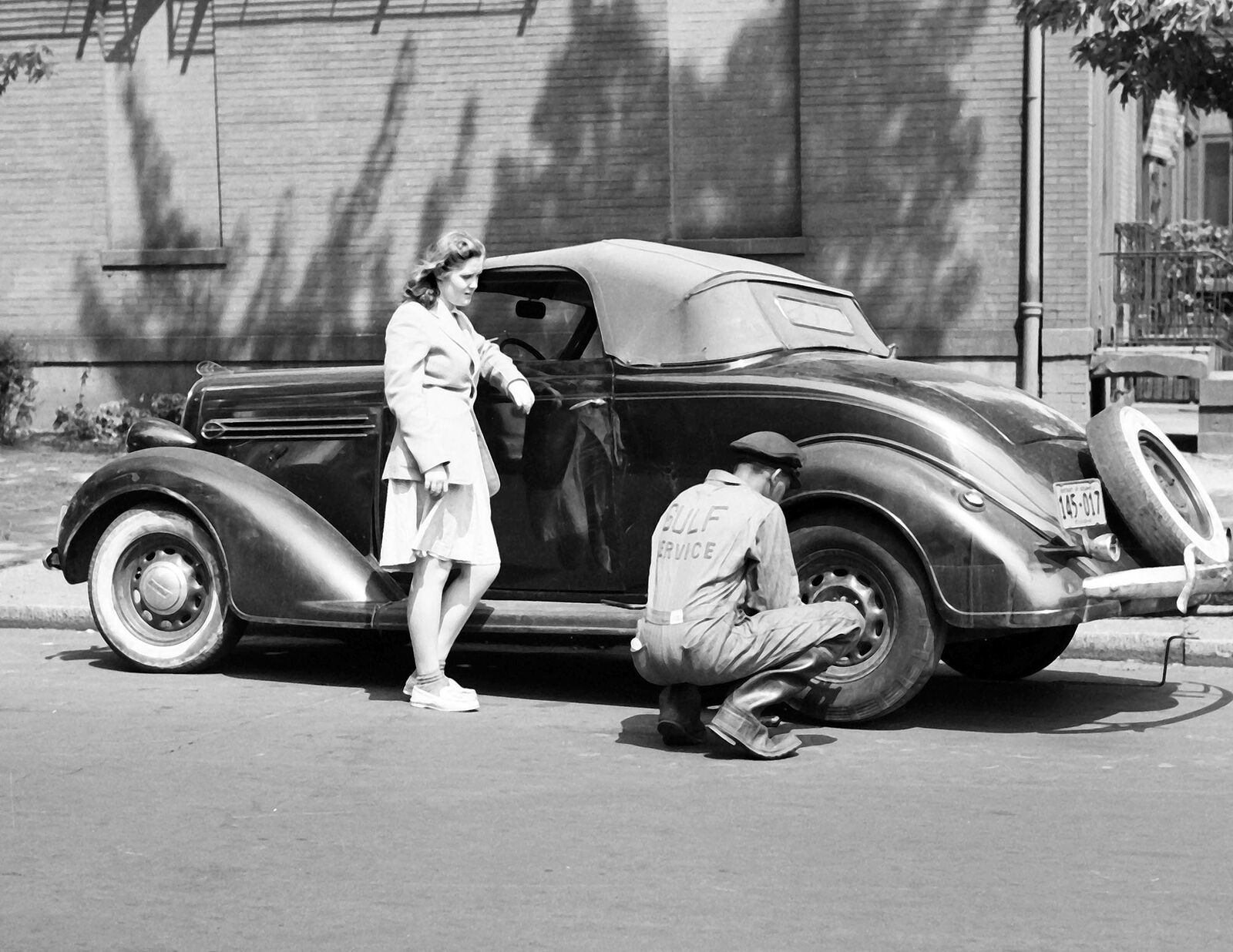 1942 Changing a Tire for a Stranded Girl Vintage Old Photo 8.5\