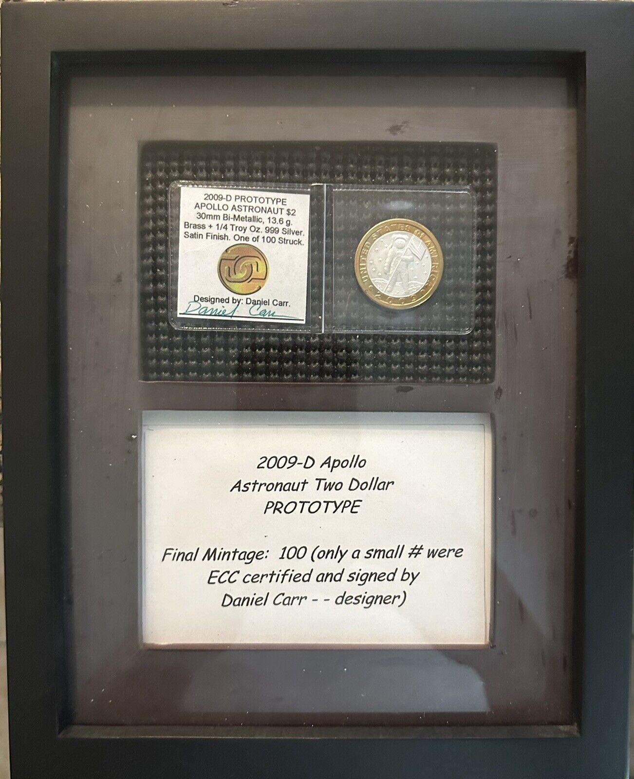 Framed Display Of 2009-D Apollo Astronaut Two Dollar Prototype Coin Signed