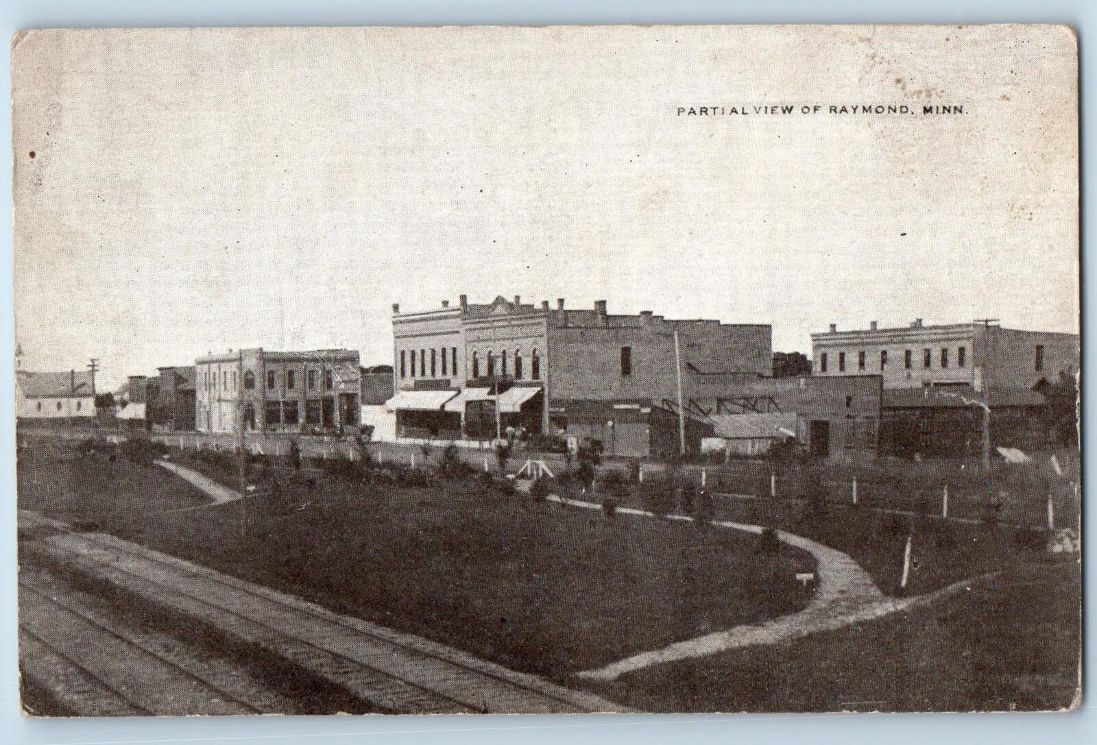 c1910's Partial View Building Railway Dirt Road Raymond Minnesota MN Postcard
