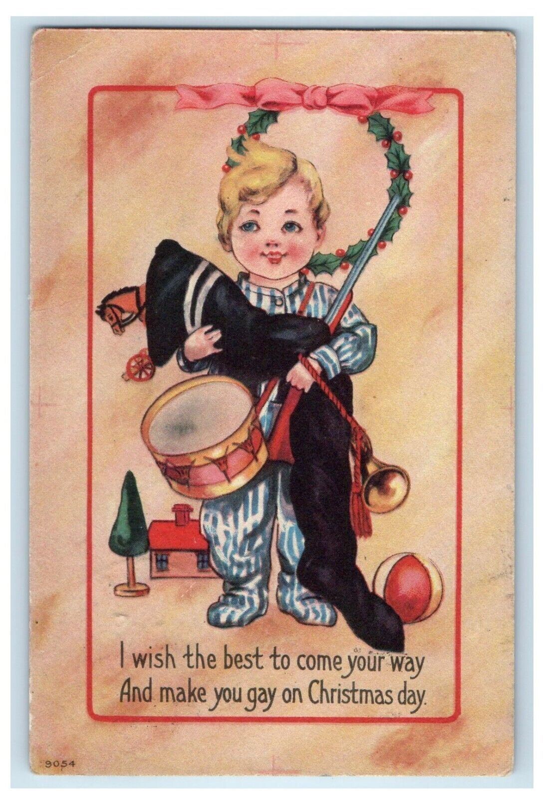 c1910's Christmas Day Boy Stocking Toys Drum And Flute Posted Antique Postcard