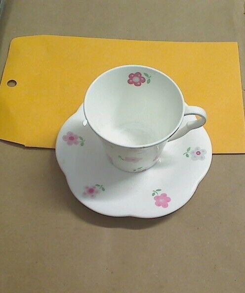 Vintage Hankook Fine Bone China Tea Cup with Floral Design and Saucer