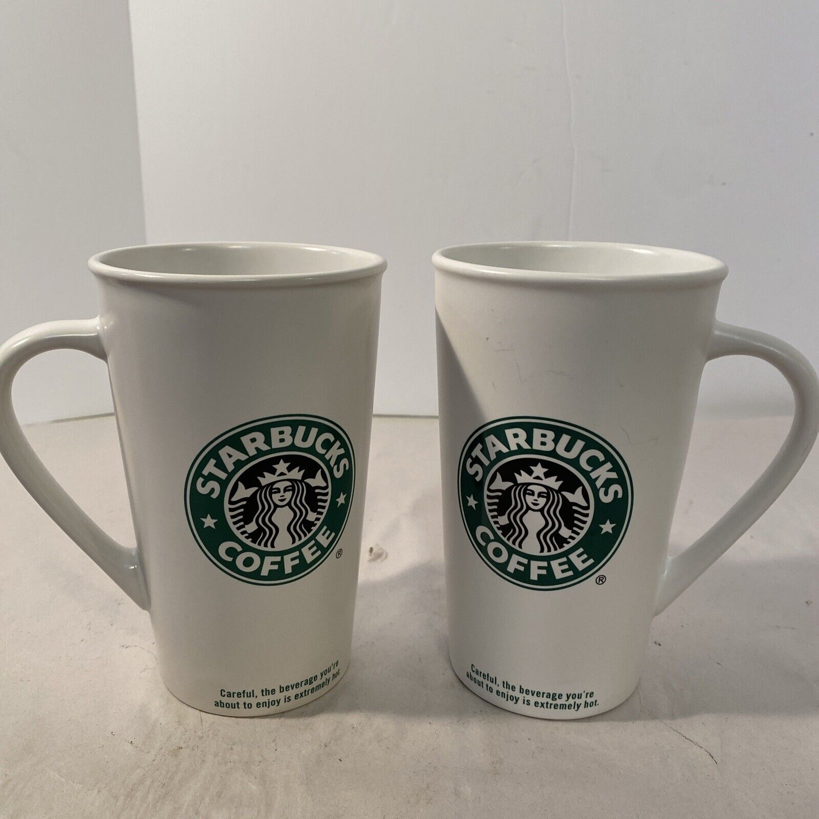 2 Starbucks 2005 & 2006 White Green 16 oz Tall Mugs Cups. Mermaid Logo. EX