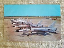 SEVEN F-105 THUNDERCHIEF JET FIGHT BOMBERS AT EGLIN AFB,FL.VTG POSTCARD*P20 picture