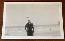 VTG 1940s Snapshot Photo Handsome USN Navy SAILOR on Beach BLIMP in background picture