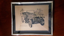 Framed image of 1909 Rolls 