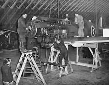 Mechanics fit parts to the supercharged Allison V-12 engine - 1941 Old Photo 1 picture