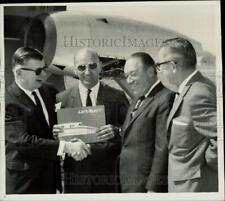 1963 Press Photo Officers gather with the CJ610-1 engine and its test stand picture