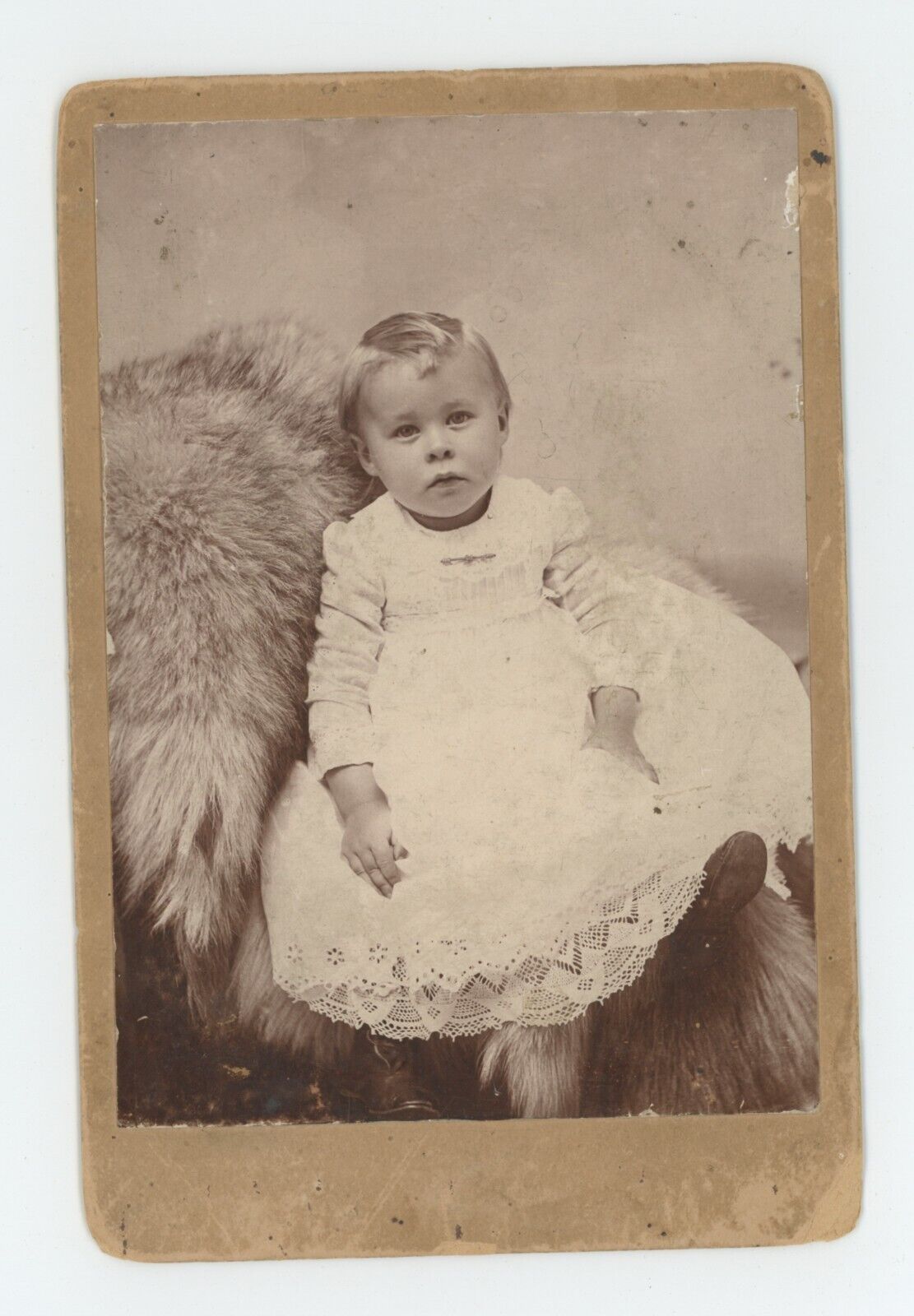 Antique Circa 1880s Cabinet Card Adorable Little Child in Dress Sitting on Fur