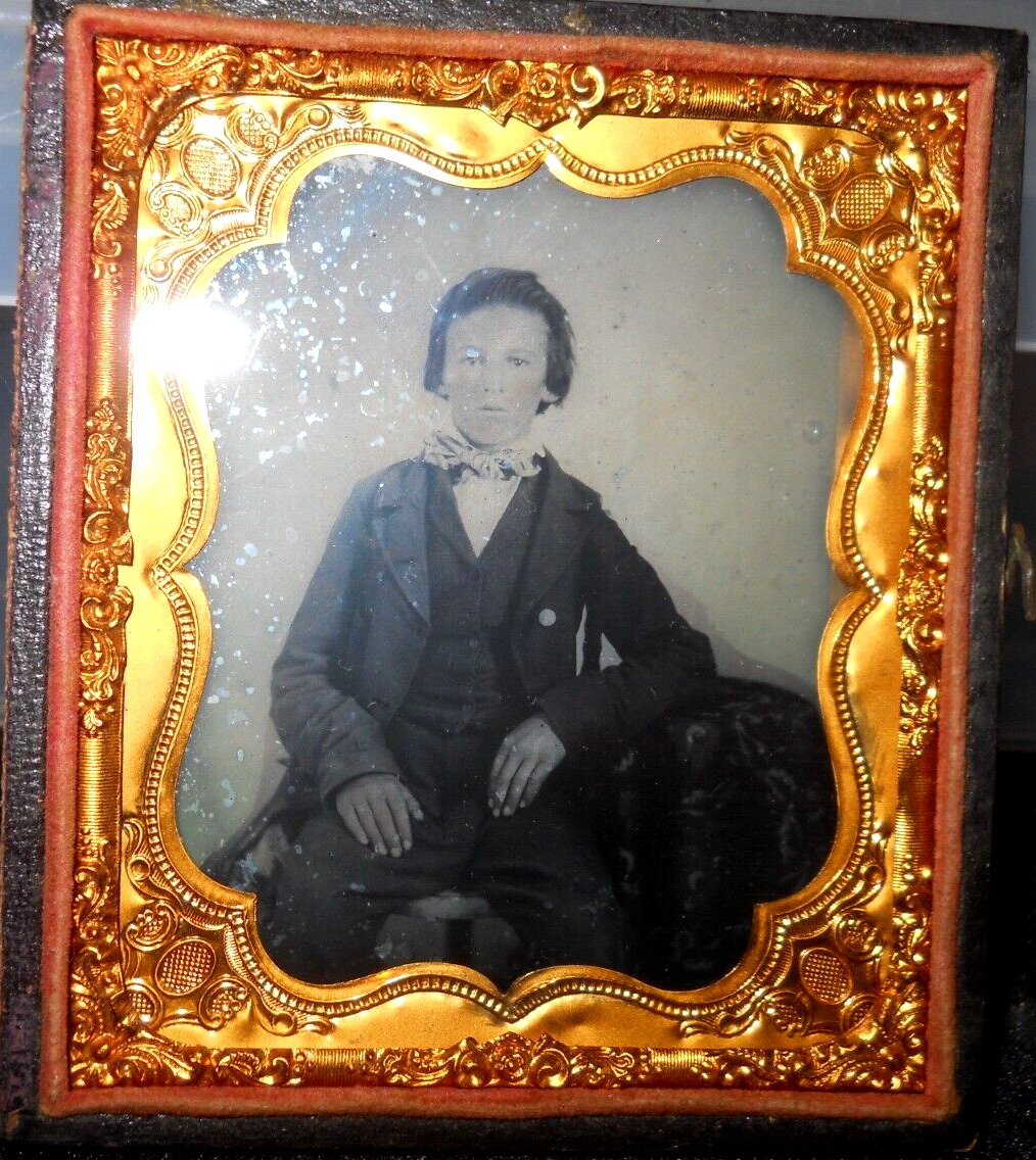 1/6th size Relievo Ambrotype of young man in half case