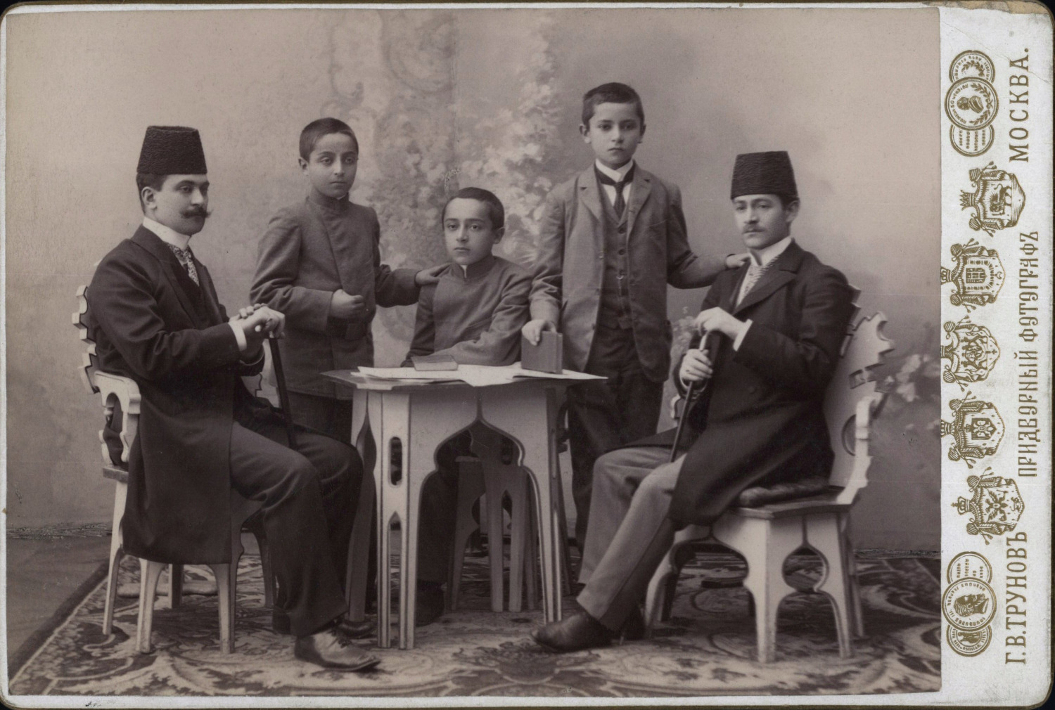 Studio Portrait of two Persian Qajar Dignatories and their sons.  Photograph: H.