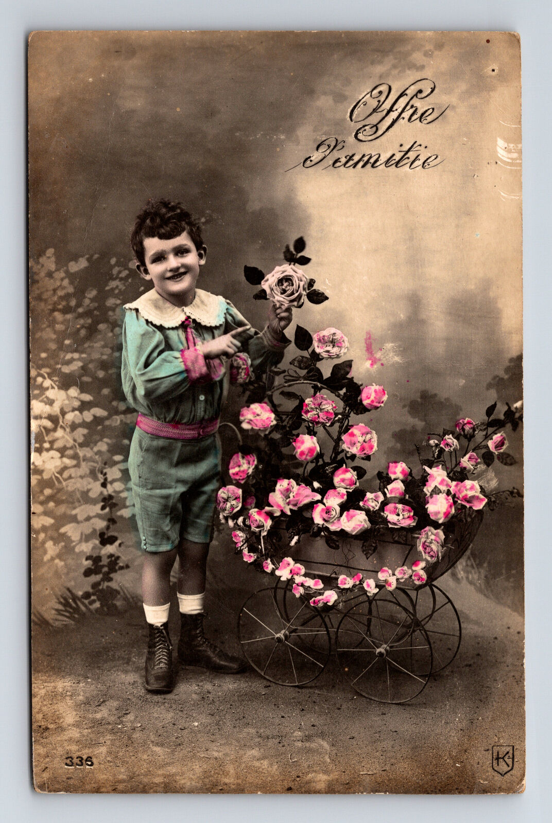 1913 RPPC Studio Portrait of Young French Boy Pink Flowers Hand Colored Postcard