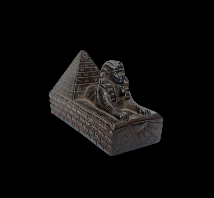 The ancient Egyptian Pharaonic Sphinx and the rare and unique pyramid statue