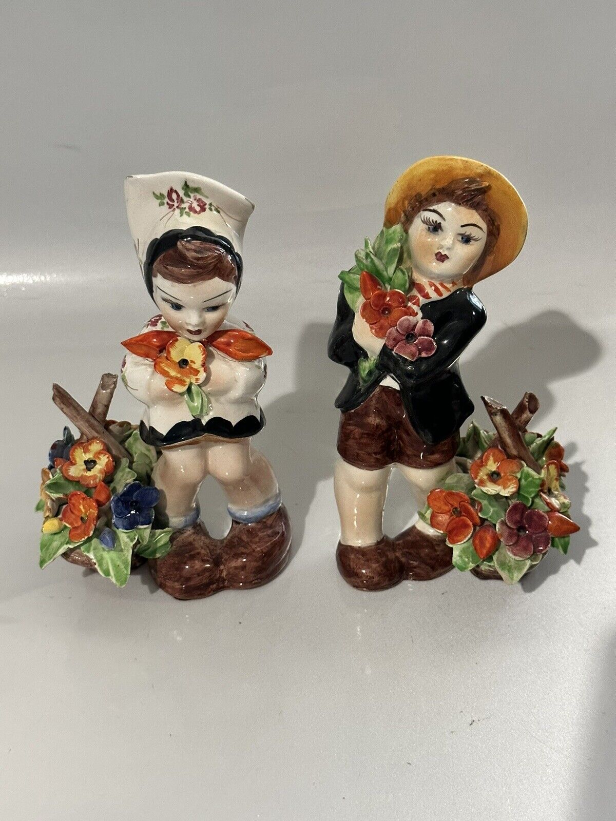 vintage Dutch flower girl and boy with baskets of flowers glazed porcelain 6.5