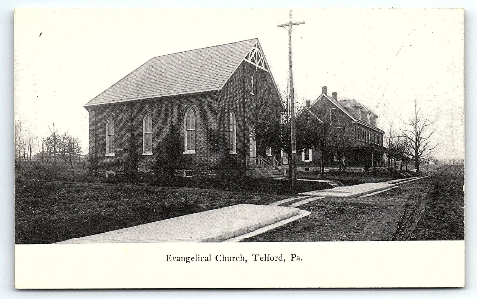 c1910 TELFORD PA EVANGELICAL CHURCH STREET VIEW EARLY UNPOSTED POSTCARD P3987
