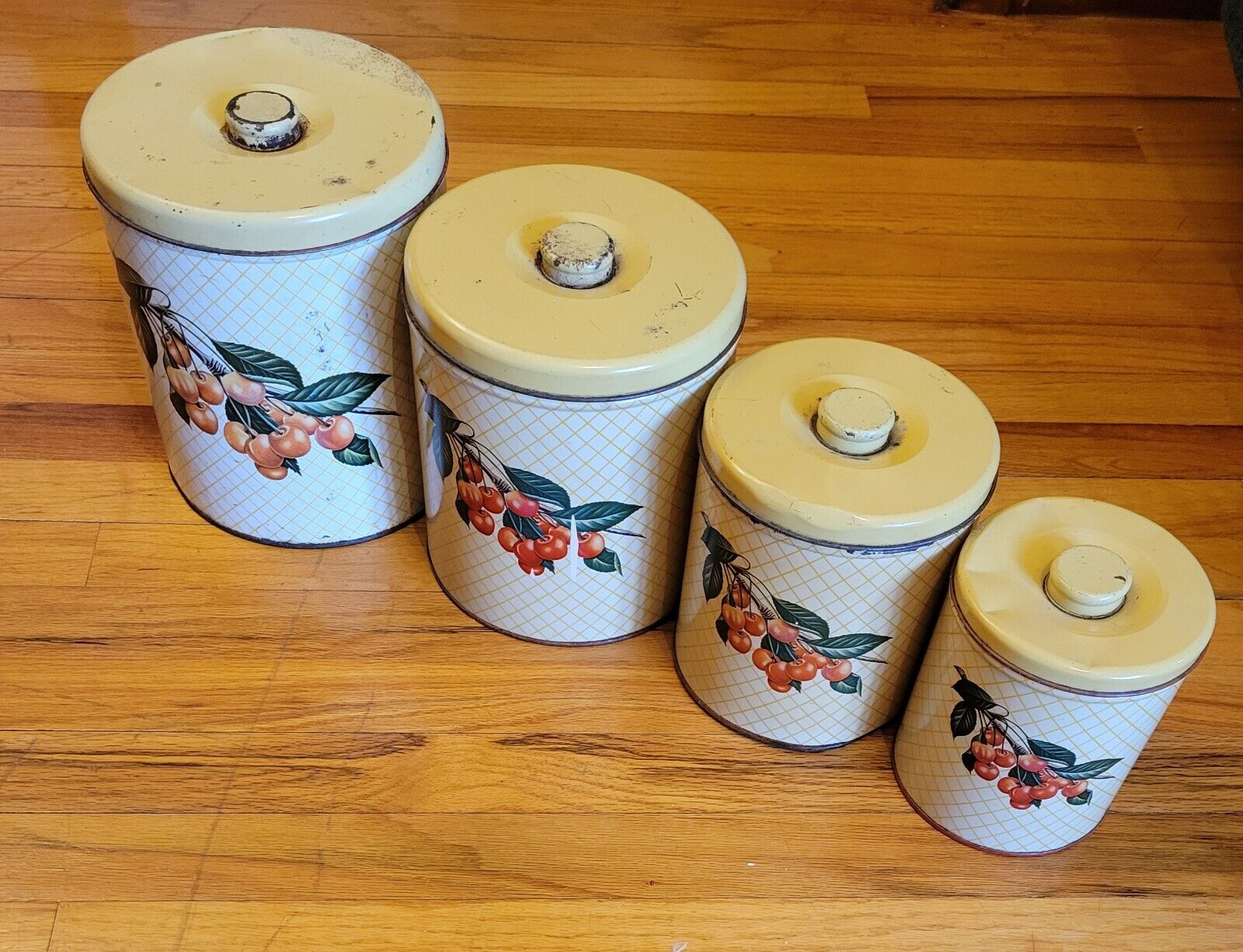 4 Vintage 1950s Decoware Distressed Tin Nesting Canisters with Cherry Design 🍒