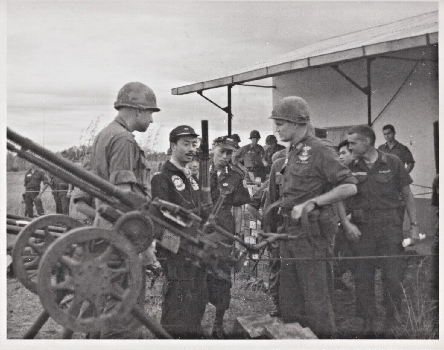 1965 Vietnam- Prime Minister views weapons seized Viet Cong - Vintage Print 8x10