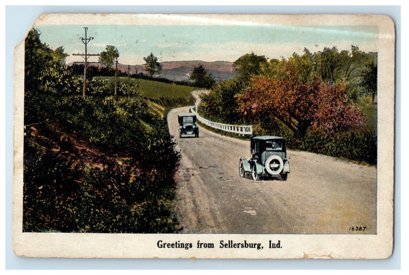 c1930's Greetings From Sellersburg Indiana IN, Road And Cars Vintage Postcard