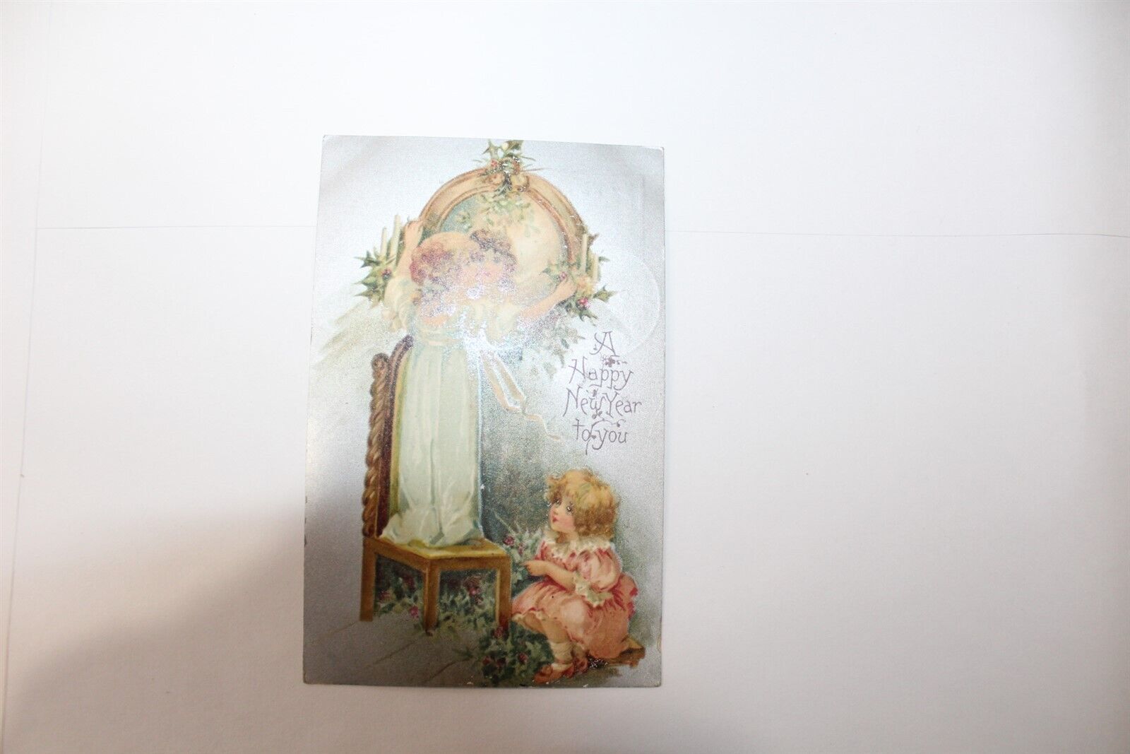 Ca. 1900's Post Card with Cancelled Postage 1907 A Happy New Year Child & Holly