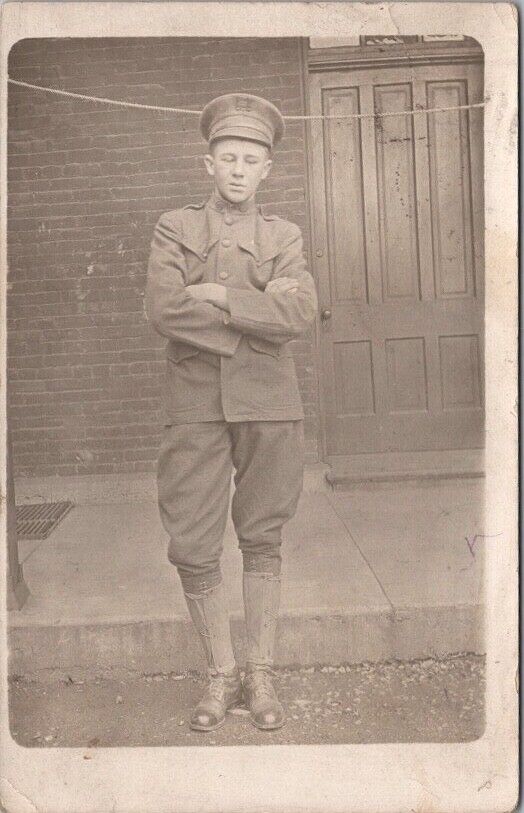 1912 FORT LEAVENWORTH, Kansas Photo RPPC Postcard Young Soldier, Arms Crossed
