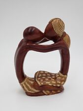 Abstract Stylized Sculpture of Two Lovers Kissing picture