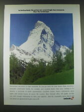 1989 SwissAir Airline Ad - In Switzerland, the prices are surprisingly less picture